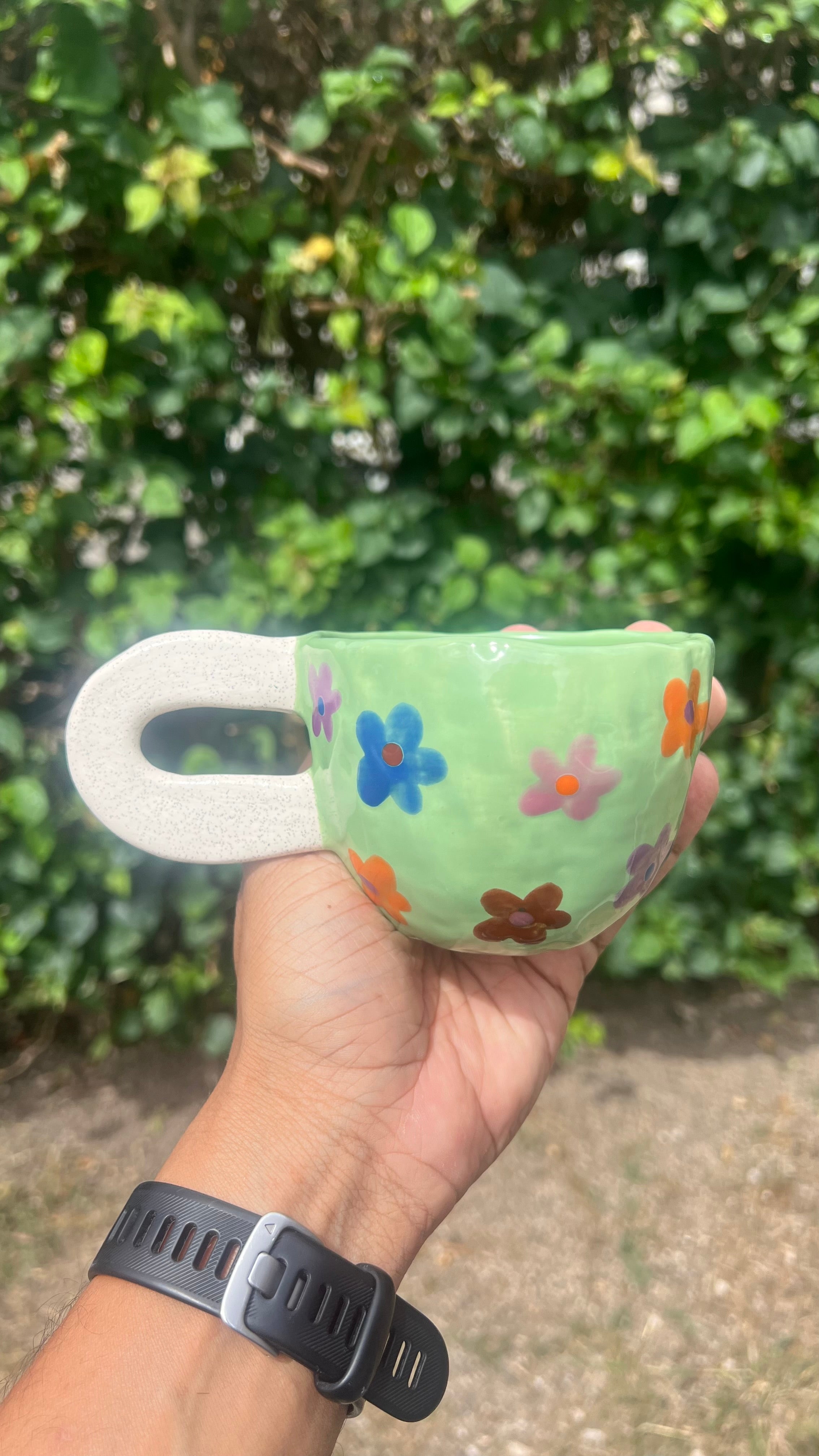 Taza verde - flores de colores